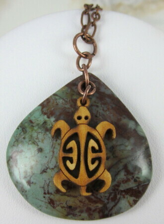 African green opal pendant with wood turtle charm and copper charm