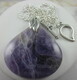 Amethyst gemstone pendant on silver-plate cable chain
