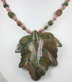 Carved rhyolite leaf with unakite and rhodonite