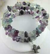 Green, blue, clear, and purple fluorite memory wire bracelet with pewter peace dove charm