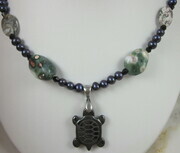 Hematite turtle (honu) ocean jasper and pearl necklace