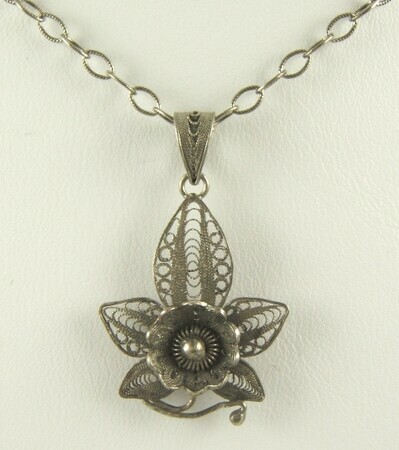 Antique silver filigree orchid pendant