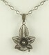 Antique silver filigree orchid pendant