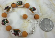 Llama bead bracelet with burnt orange acai seeds