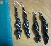 Twirly black dangle earrings